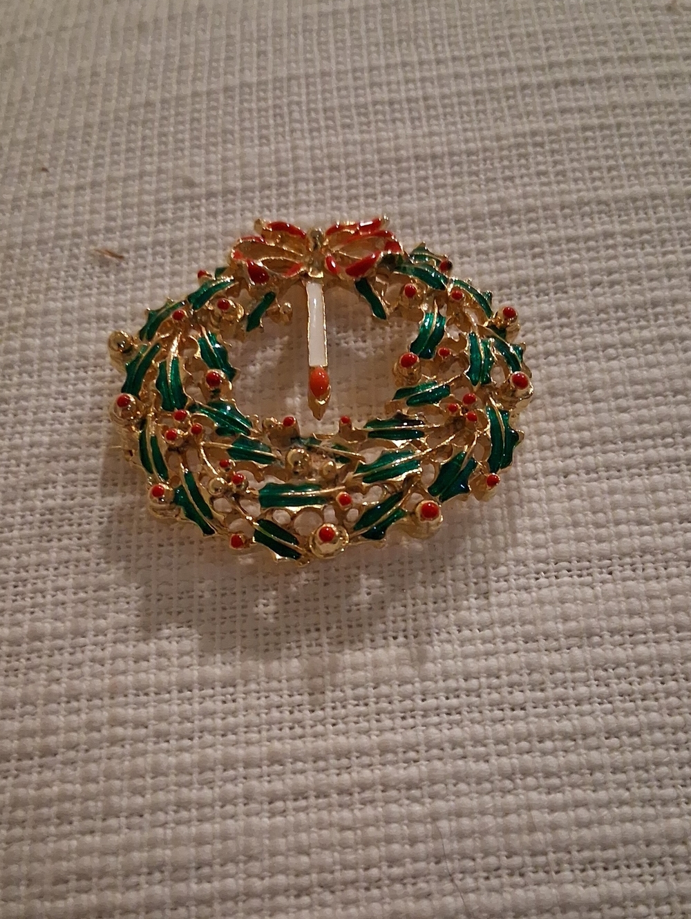 Gold-Tone Holiday Wreath Brooch with Green Leaves and Red Accents